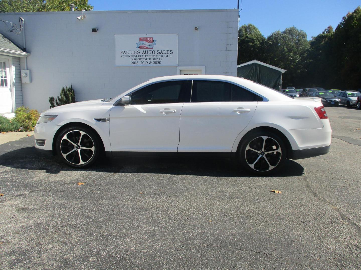 2014 WHITE Ford Taurus SEL FWD (1FAHP2E81EG) with an 3.5L V6 DOHC 24V engine, 6-Speed Automatic transmission, located at 540a Delsea Drive, Sewell, NJ, 08080, (856) 589-6888, 39.752560, -75.111206 - Photo#2