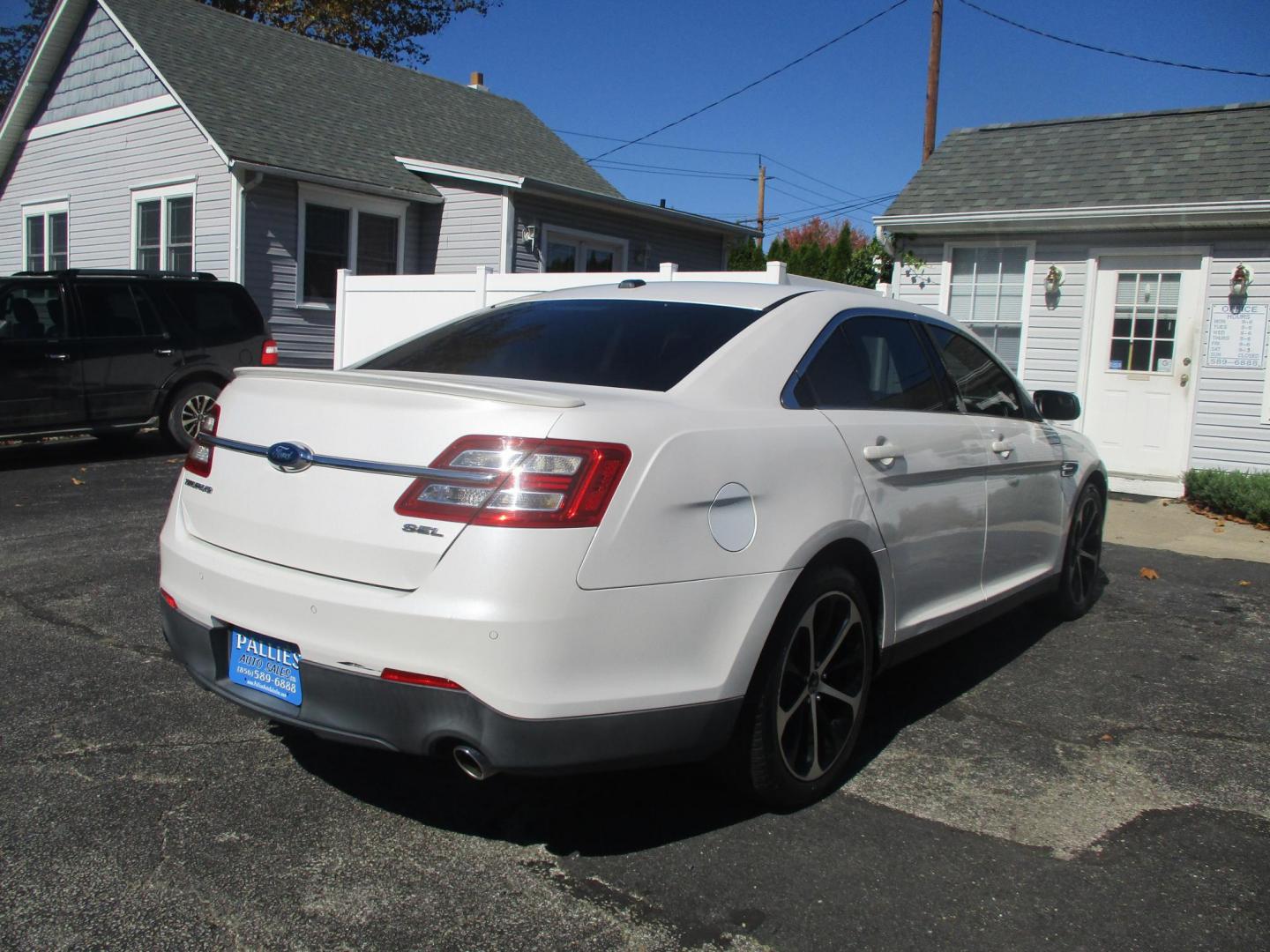 2014 WHITE Ford Taurus SEL FWD (1FAHP2E81EG) with an 3.5L V6 DOHC 24V engine, 6-Speed Automatic transmission, located at 540a Delsea Drive, Sewell, NJ, 08080, (856) 589-6888, 39.752560, -75.111206 - Photo#4