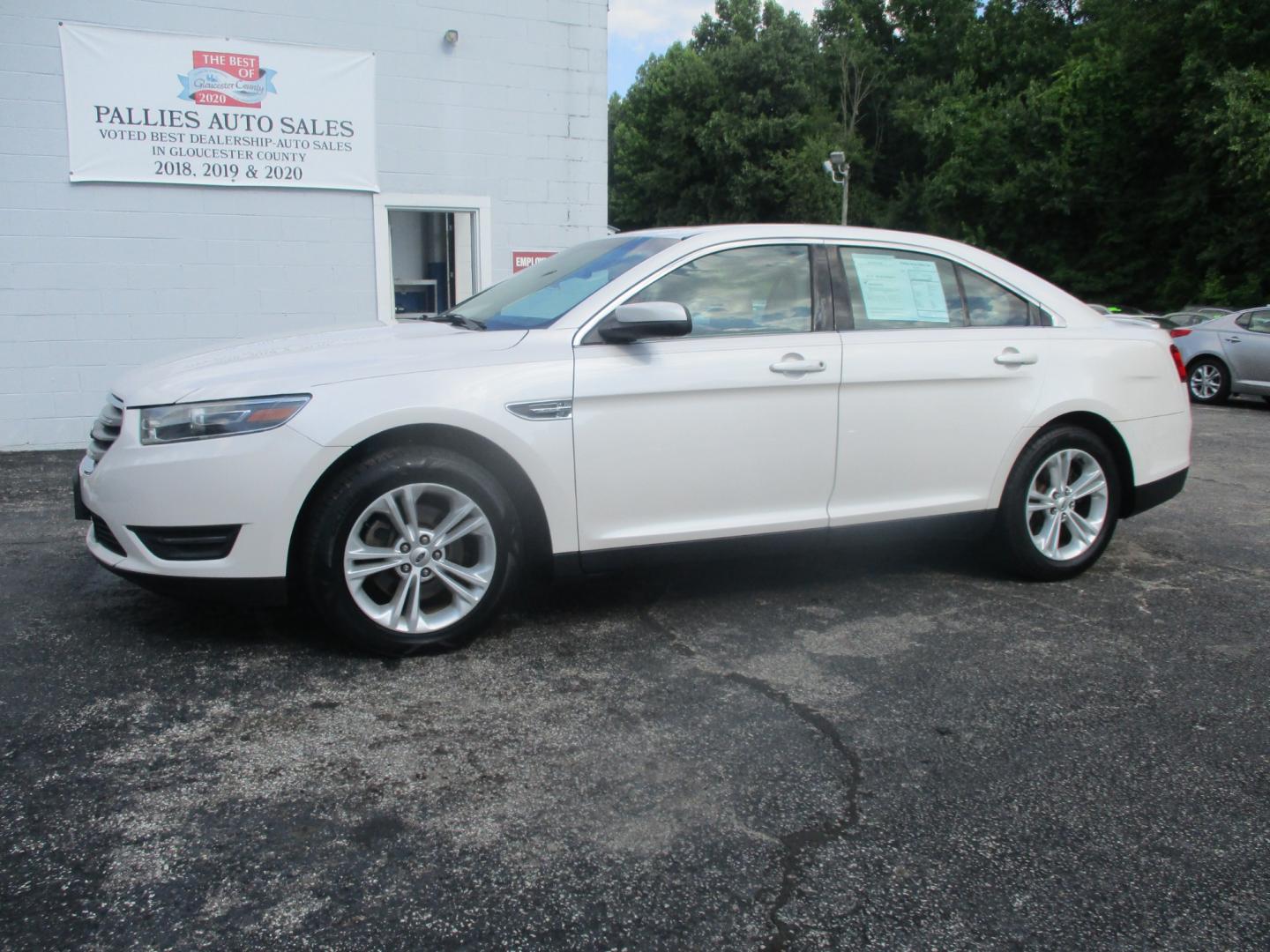 2015 WHITE Ford Taurus (1FAHP2E84FG) , AUTOMATIC transmission, located at 540a Delsea Drive, Sewell, NJ, 08080, (856) 589-6888, 39.752560, -75.111206 - Photo#1