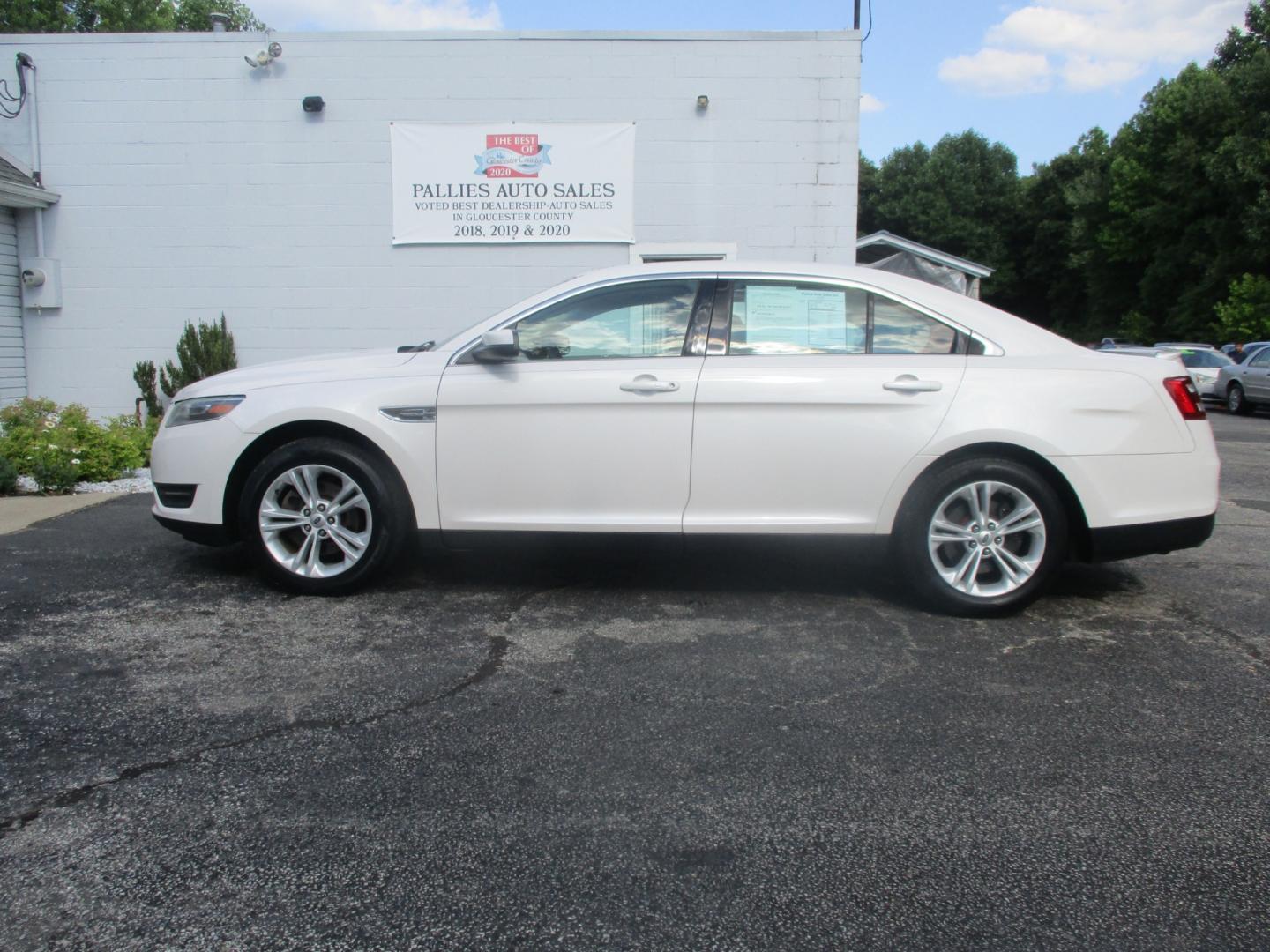 2015 WHITE Ford Taurus (1FAHP2E84FG) , AUTOMATIC transmission, located at 540a Delsea Drive, Sewell, NJ, 08080, (856) 589-6888, 39.752560, -75.111206 - Photo#2