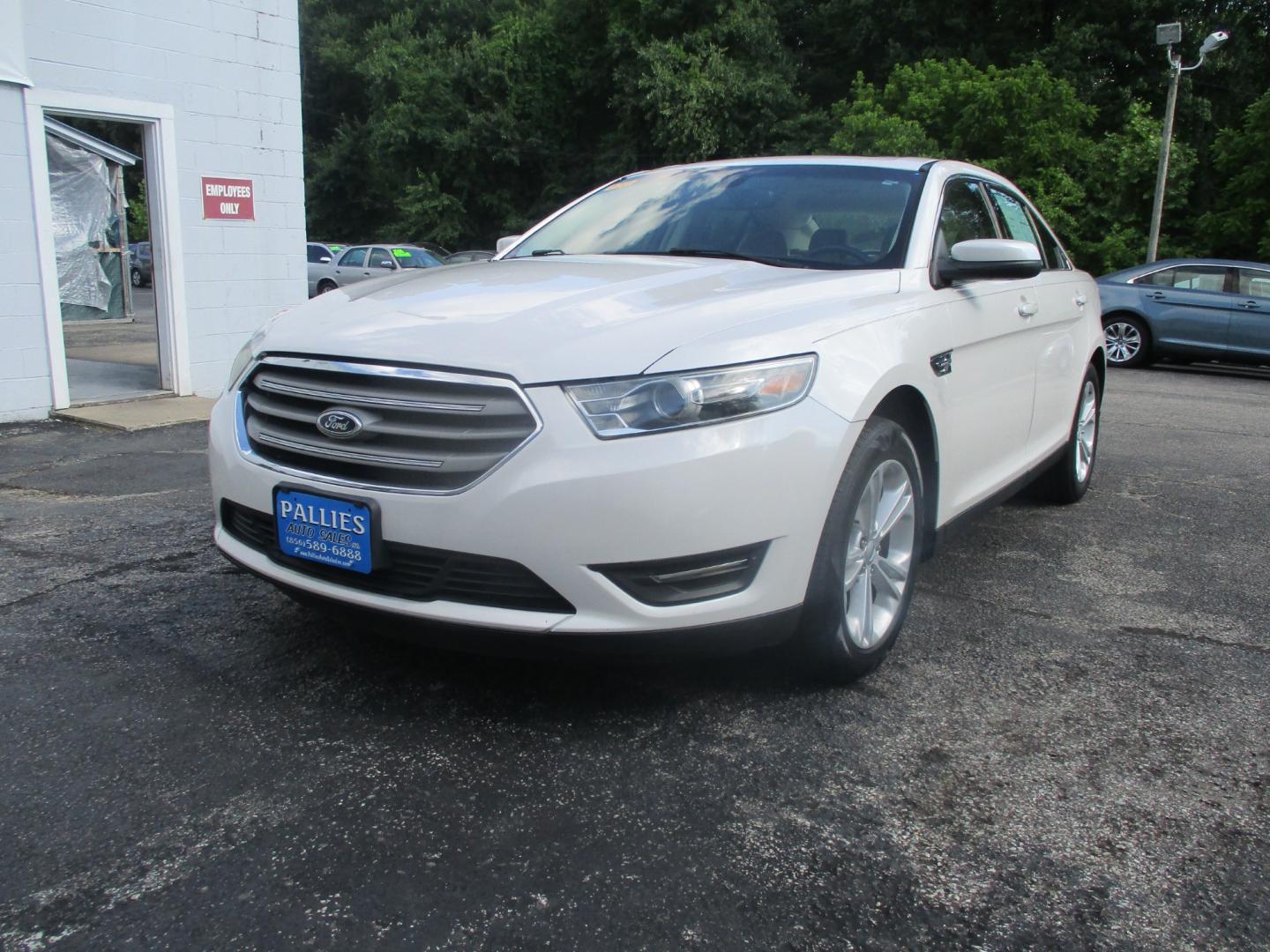 2015 WHITE Ford Taurus (1FAHP2E84FG) , AUTOMATIC transmission, located at 540a Delsea Drive, Sewell, NJ, 08080, (856) 589-6888, 39.752560, -75.111206 - Photo#0