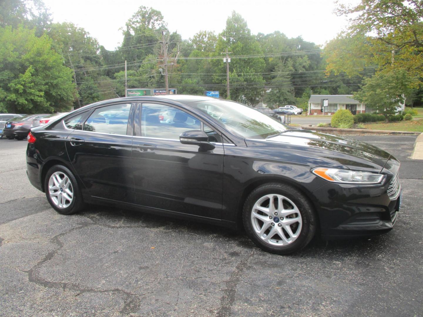 2016 BLACK Ford Fusion SE (3FA6P0H79GR) with an 2.5L L4 DOHC 16V engine, 6-Speed Automatic transmission, located at 540a Delsea Drive, Sewell, NJ, 08080, (856) 589-6888, 39.752560, -75.111206 - Photo#8