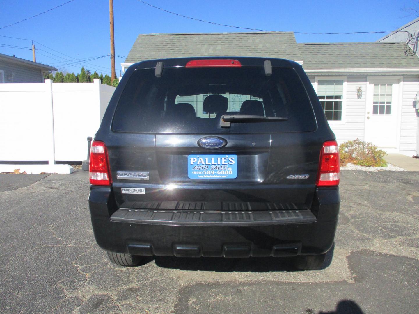 2008 BLACK Ford Escape XLT 4WD V6 (1FMCU93138K) with an 3.0L V6 DOHC 24V engine, 4-Speed Automatic Overdrive transmission, located at 540a Delsea Drive, Sewell, NJ, 08080, (856) 589-6888, 39.752560, -75.111206 - Photo#5