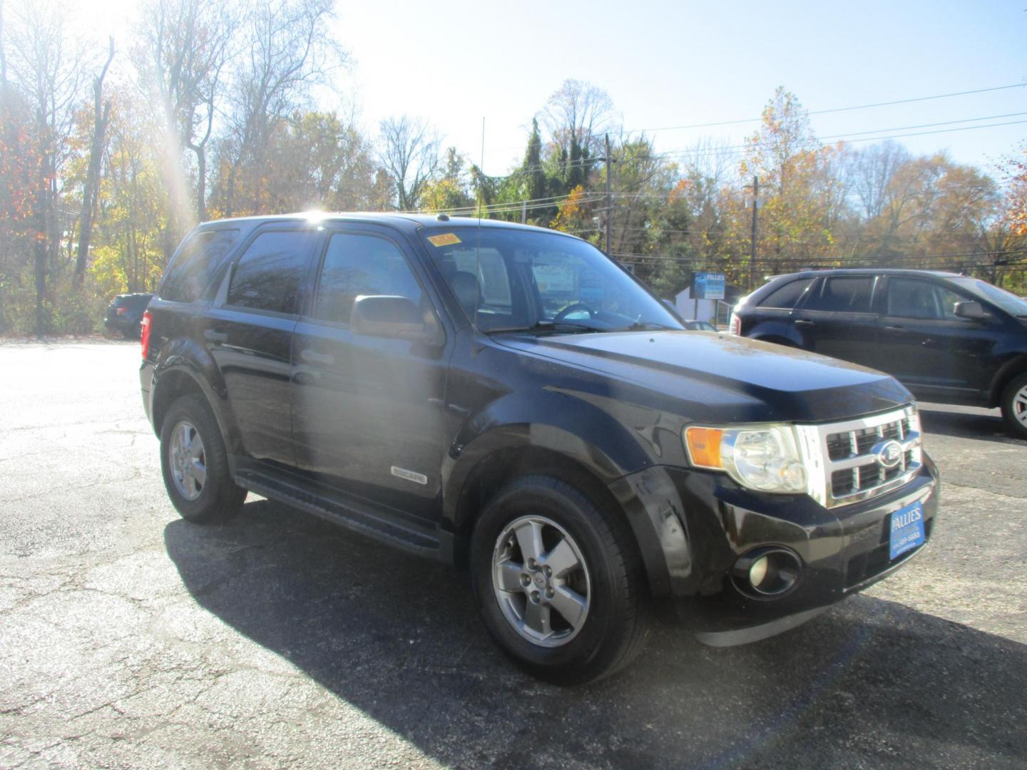 2008 BLACK Ford Escape XLT 4WD V6 (1FMCU93138K) with an 3.0L V6 DOHC 24V engine, 4-Speed Automatic Overdrive transmission, located at 540a Delsea Drive, Sewell, NJ, 08080, (856) 589-6888, 39.752560, -75.111206 - Photo#9