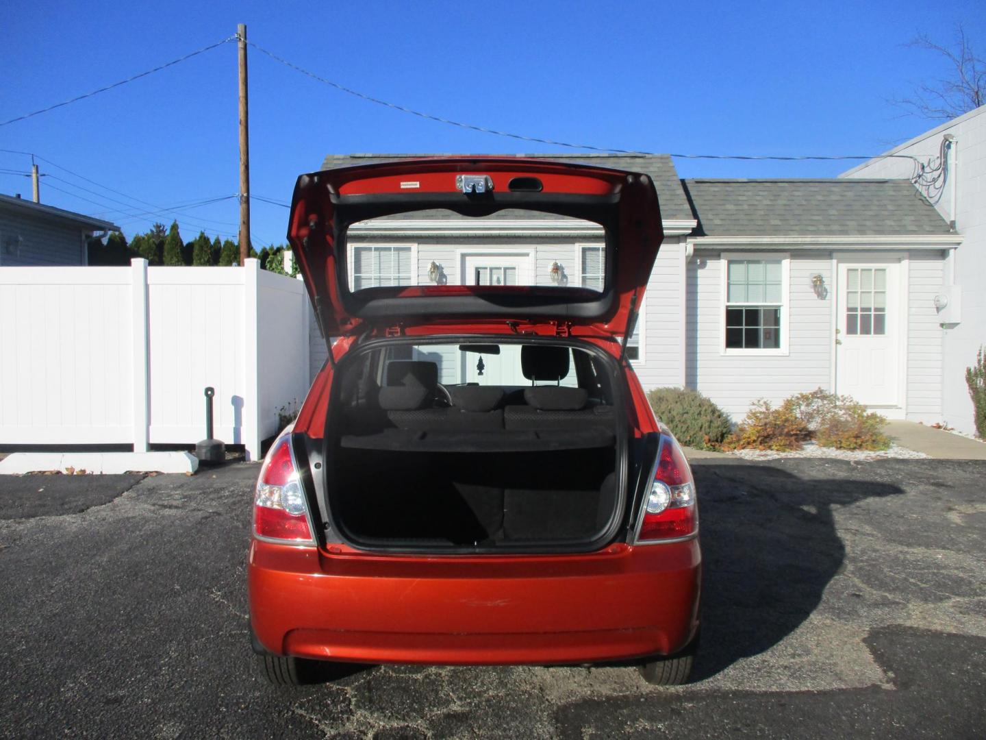 2010 ORANGE Hyundai Accent Blue GS 3-Door (KMHCM3AC7AU) with an 1.6L L4 DOHC 16V engine, located at 540a Delsea Drive, Sewell, NJ, 08080, (856) 589-6888, 39.752560, -75.111206 - Photo#24