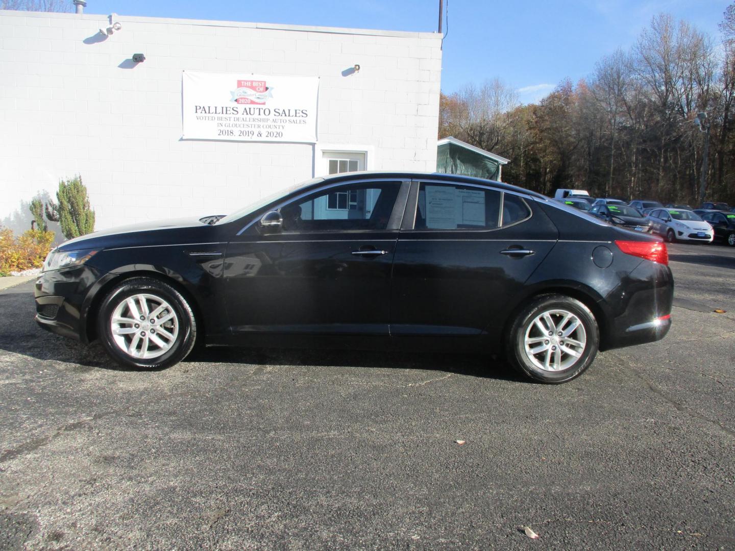 2012 BLACK Kia Optima LX MT (KNAGM4A74C5) with an 2.4L L4 DOHC 16V engine, 6-Speed Manual transmission, located at 540a Delsea Drive, Sewell, NJ, 08080, (856) 589-6888, 39.752560, -75.111206 - Photo#1