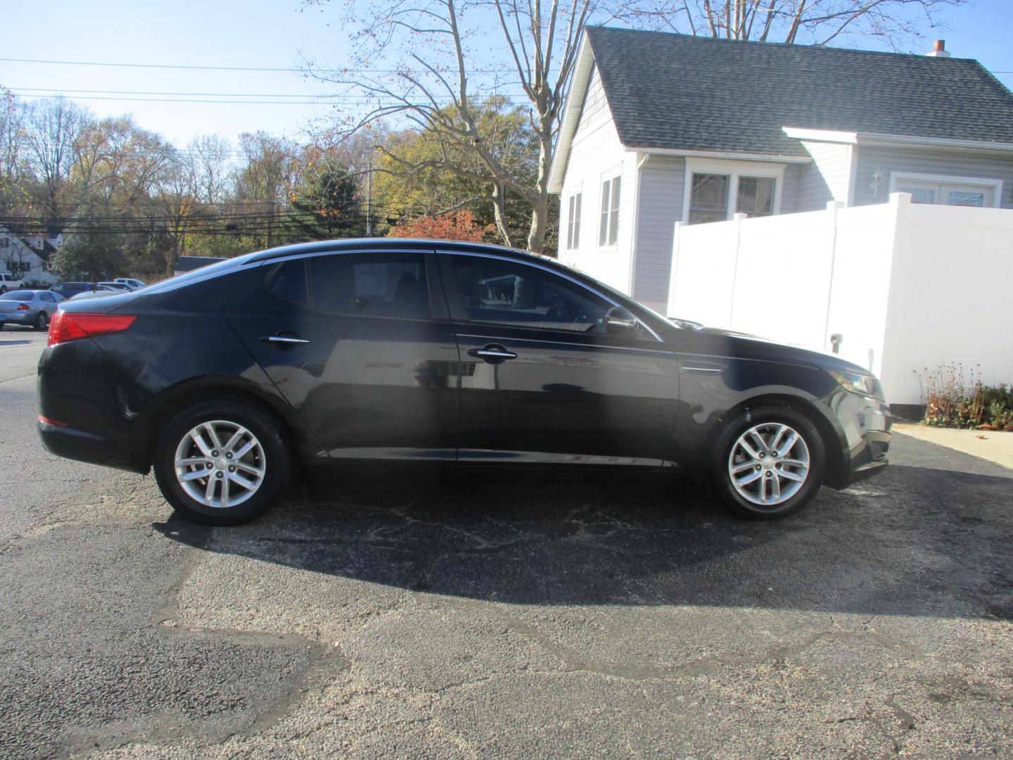 2012 BLACK Kia Optima LX MT (KNAGM4A74C5) with an 2.4L L4 DOHC 16V engine, 6-Speed Manual transmission, located at 540a Delsea Drive, Sewell, NJ, 08080, (856) 589-6888, 39.752560, -75.111206 - Photo#8