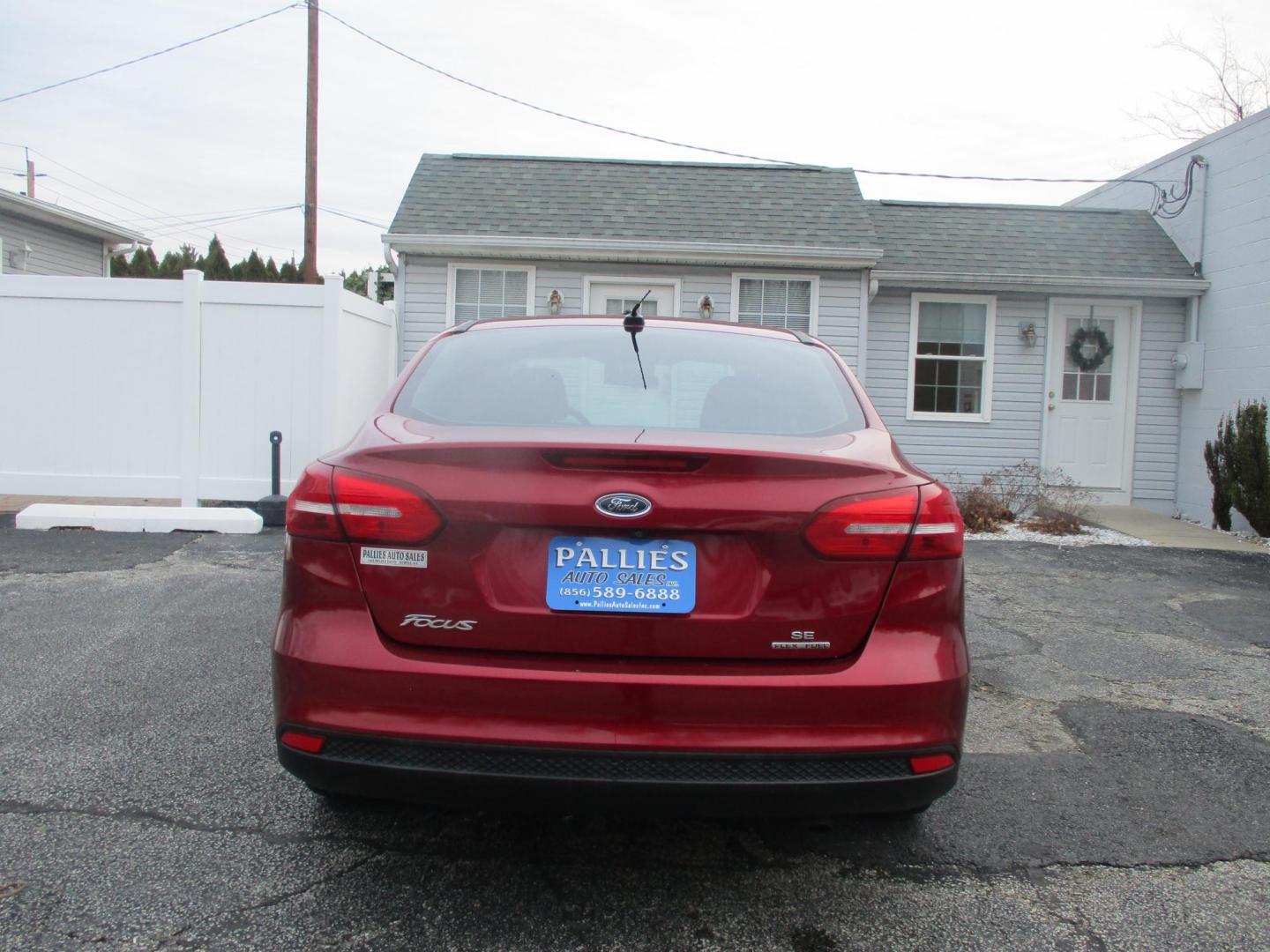 2015 RED Ford Focus SE Sedan (1FADP3F25FL) with an 2.0L L4 DOHC 16V engine, located at 540a Delsea Drive, Sewell, NJ, 08080, (856) 589-6888, 39.752560, -75.111206 - Photo#5