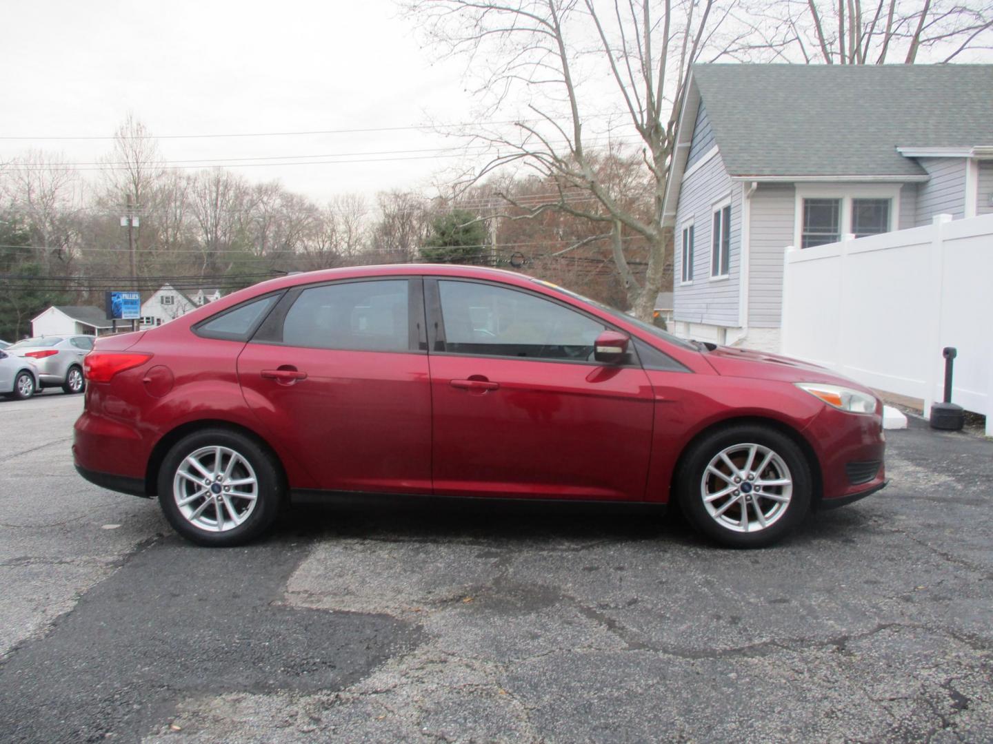 2015 RED Ford Focus SE Sedan (1FADP3F25FL) with an 2.0L L4 DOHC 16V engine, located at 540a Delsea Drive, Sewell, NJ, 08080, (856) 589-6888, 39.752560, -75.111206 - Photo#8